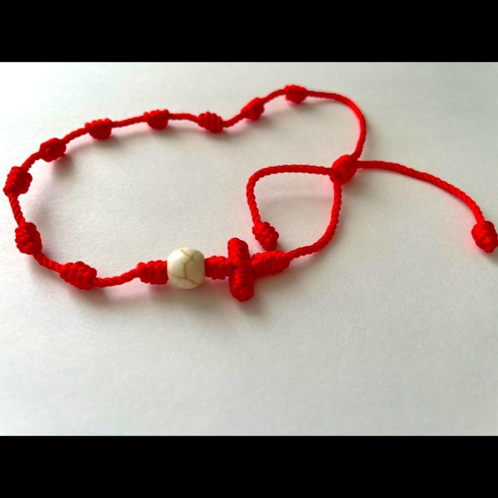 Red braided adjustable cross bracelet